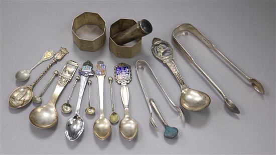 A pair of silver napkin rings, a cased cigar holder and a small group of silver and plated flatware.